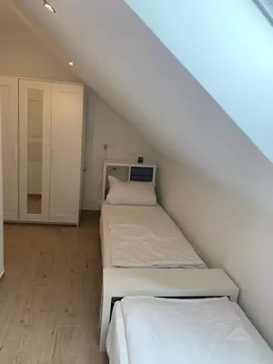 Ein Bett oder Betten in einem Zimmer der Unterkunft FreiRaum
