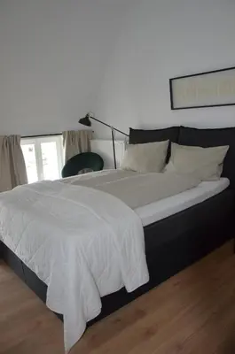 Ein Bett oder Betten in einem Zimmer der Unterkunft Wersauer Hof - Ferme Auberge