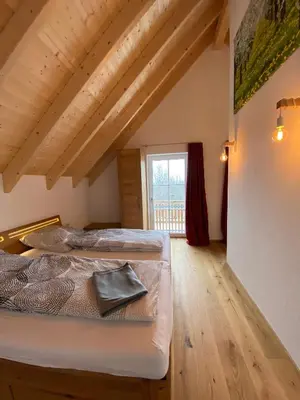 Ein Bett oder Betten in einem Zimmer der Unterkunft Ferienwohnung Apfelkrönchen