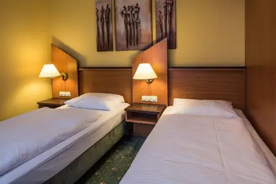 Ein Bett oder Betten in einem Zimmer der Unterkunft Hotel Sperling mit E-Ladestation