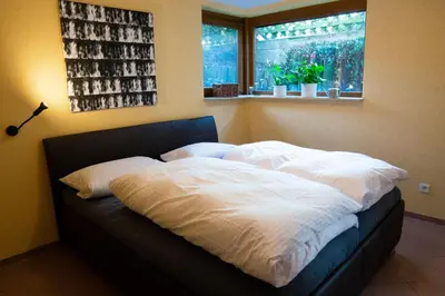 Ein Bett oder Betten in einem Zimmer der Unterkunft Ferienwohnung grüne Oase