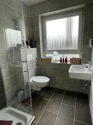 Ein Badezimmer in der Unterkunft Wohnen beim Brotsommelier - Holzmichel