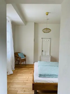 Ein Bett oder Betten in einem Zimmer der Unterkunft das Höfchen Stadecken