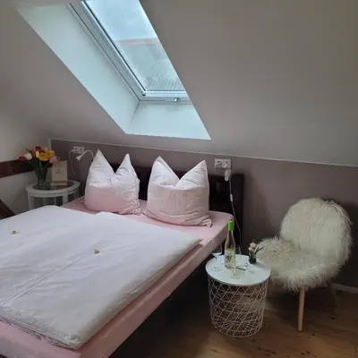 Ein Bett oder Betten in einem Zimmer der Unterkunft das Höfchen Stadecken