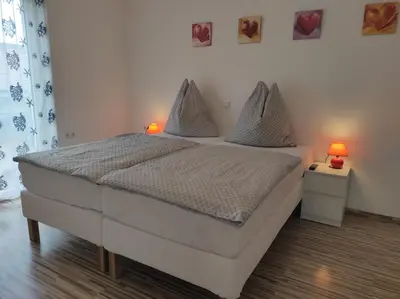 Ein Bett oder Betten in einem Zimmer der Unterkunft Ferienwohnung Christoph,nahe Burg Steinsberg