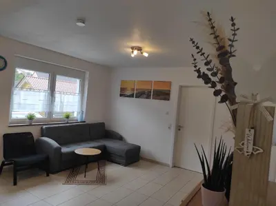 Ein Sitzbereich in der Unterkunft Ferienwohnung Christoph,nahe Burg Steinsberg