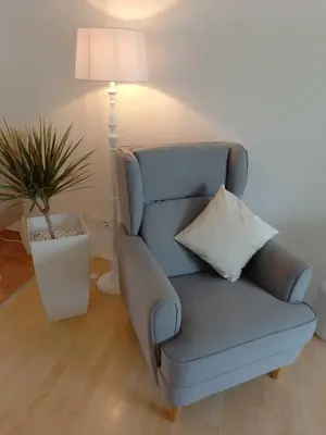 Ein Sitzbereich in der Unterkunft Muemling Apartment 2