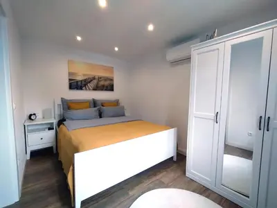 Ein Bett oder Betten in einem Zimmer der Unterkunft Das Mini-Haus im Herzen Großostheims