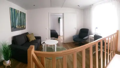 Ein Sitzbereich in der Unterkunft Das Mini-Haus im Herzen Großostheims