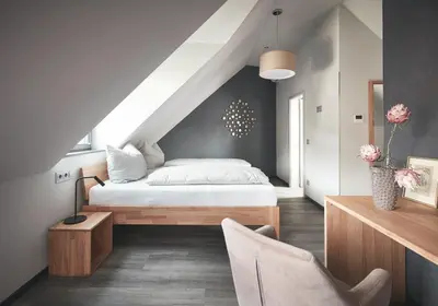 Ein Bett oder Betten in einem Zimmer der Unterkunft Hotel Landlust St. Martin