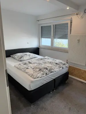 Ein Bett oder Betten in einem Zimmer der Unterkunft Schönblick