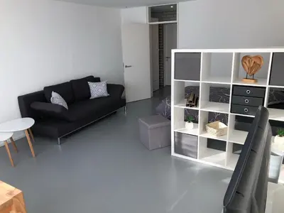 Ein Sitzbereich in der Unterkunft Ferienwohnung mit hervorragender Aussicht