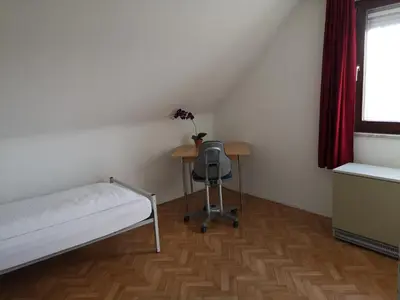 Ein Bett oder Betten in einem Zimmer der Unterkunft Juni o