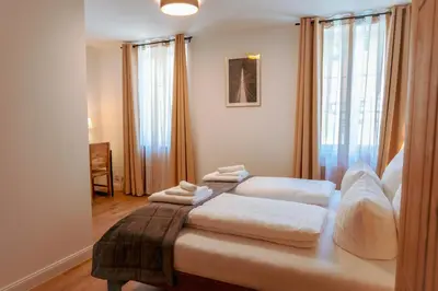 Ein Bett oder Betten in einem Zimmer der Unterkunft Landhotel Engel & Kreuz