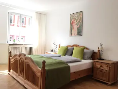 Ein Bett oder Betten in einem Zimmer der Unterkunft Heidelberg Apheartments