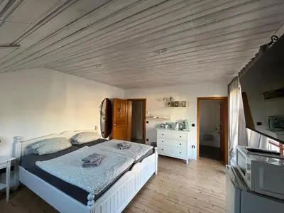 Ein Bett oder Betten in einem Zimmer der Unterkunft Landhaus Bad Rotenfels - Bethel