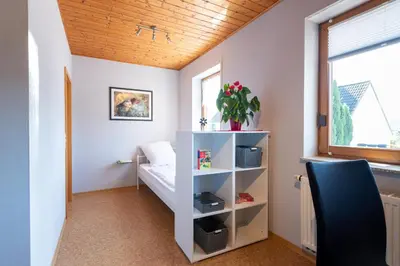 Ein Bett oder Betten in einem Zimmer der Unterkunft Ferienwohnung Hauk