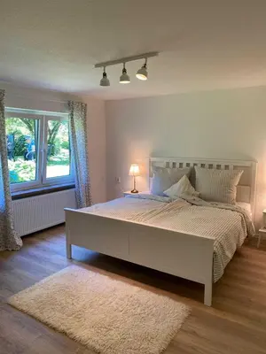 Ein Bett oder Betten in einem Zimmer der Unterkunft Ferienwohnung miraBelle