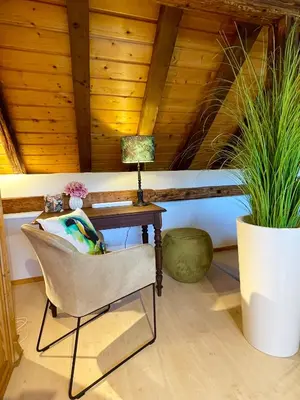 Ein Sitzbereich in der Unterkunft Ferienhaus Zur Hofreite