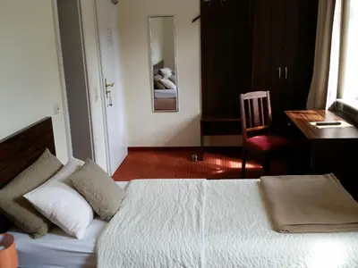 Ein Bett oder Betten in einem Zimmer der Unterkunft Linde Restaurant & Hotel