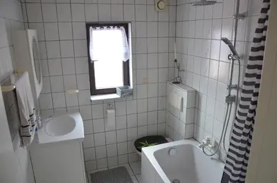 Ein Badezimmer in der Unterkunft PalmGarden