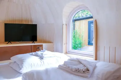 Ein Bett oder Betten in einem Zimmer der Unterkunft Tortuga - einfach anders!