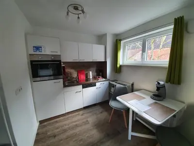 Küche/Küchenzeile in der Unterkunft Ferienwohnung Raiffeisenstraße - Obernburg