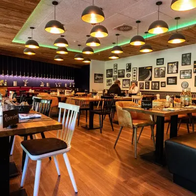 Ein Restaurant oder anderes Speiselokal in der Unterkunft Residenz Wessinger, Neu-Isenburg
