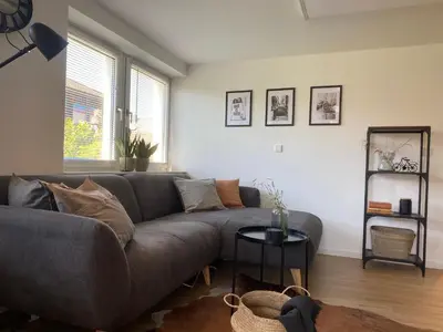 Ein Sitzbereich in der Unterkunft ☆FEWO ALTES KINO - MODERN - QUIET - 65M² - TV - NETFLIX - WLAN☆