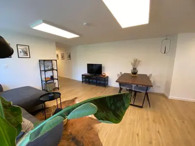 Ein Sitzbereich in der Unterkunft ☆FEWO ALTES KINO - MODERN - QUIET - 65M² - TV - NETFLIX - WLAN☆