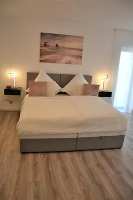 Ein Bett oder Betten in einem Zimmer der Unterkunft Sophie Superior Apartment