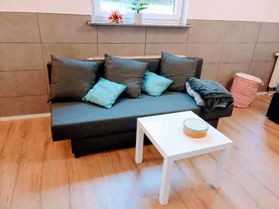 Ein Sitzbereich in der Unterkunft Ferienwohnung Familie Schwarz