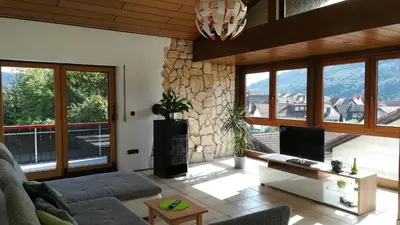 Ein Sitzbereich in der Unterkunft Ferienwohnung Fröhlich