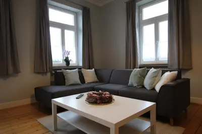 Ein Sitzbereich in der Unterkunft Ferienwohnung Altes Pfarrhaus Bargen