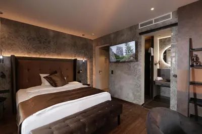 Ein Bett oder Betten in einem Zimmer der Unterkunft REINHARDTs HOTEL