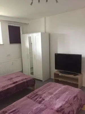Ein Bett oder Betten in einem Zimmer der Unterkunft Nahe an der City für Monteure und für Urlauber