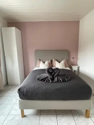 Ein Bett oder Betten in einem Zimmer der Unterkunft Wohnen beim Brotsommelier - Frankenlaib