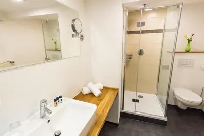 Ein Badezimmer in der Unterkunft Jäger's Landhaus Rössle