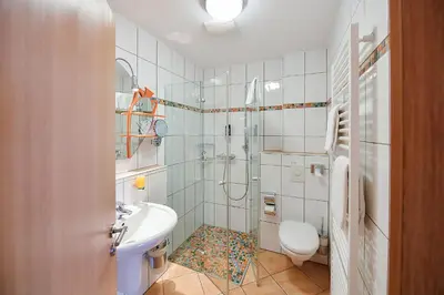 Ein Badezimmer in der Unterkunft Chalet Raabe