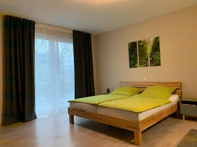 Ein Bett oder Betten in einem Zimmer der Unterkunft 2nd Home Appartements 23