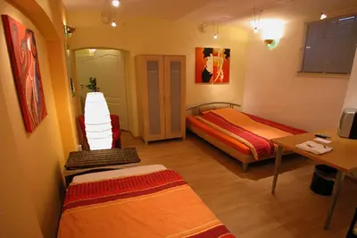 Ein Bett oder Betten in einem Zimmer der Unterkunft BudgetRooms - souterrain-private rooms & kitchen