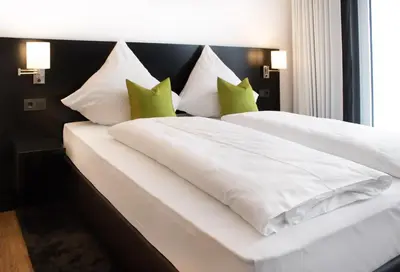 Ein Bett oder Betten in einem Zimmer der Unterkunft PFU Hotel by WMM Hotels