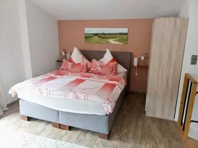 Ein Bett oder Betten in einem Zimmer der Unterkunft Ferienwohnung Familie Westermann