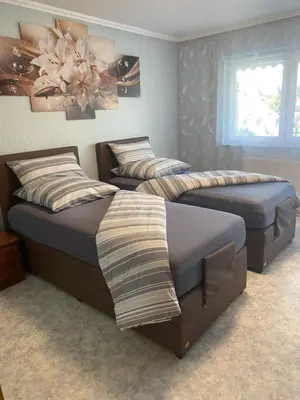 Ein Bett oder Betten in einem Zimmer der Unterkunft Berta