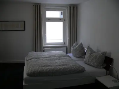 Ein Bett oder Betten in einem Zimmer der Unterkunft Ferienwohnung Speyer