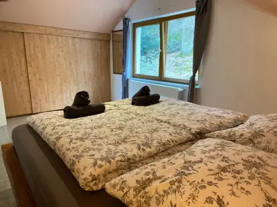 Ein Bett oder Betten in einem Zimmer der Unterkunft Ferienwohnung Fernblick Pfalz - mit Sauna