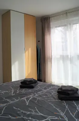 Ein Bett oder Betten in einem Zimmer der Unterkunft Flat11 4-Zi Wohnung Messe Karlsruhe