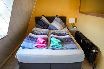 Ein Bett oder Betten in einem Zimmer der Unterkunft Schönes Studio in der Rheinebene, zentral gelegen