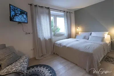 Ein Bett oder Betten in einem Zimmer der Unterkunft Sali Homes - Bergerie