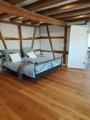 Ein Bett oder Betten in einem Zimmer der Unterkunft BEAS WOHNEN
